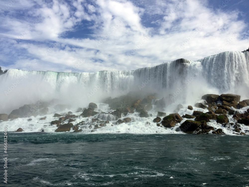 The American Falls, part of Niagara Falls, seen from a tour boat on the Niagara River.  