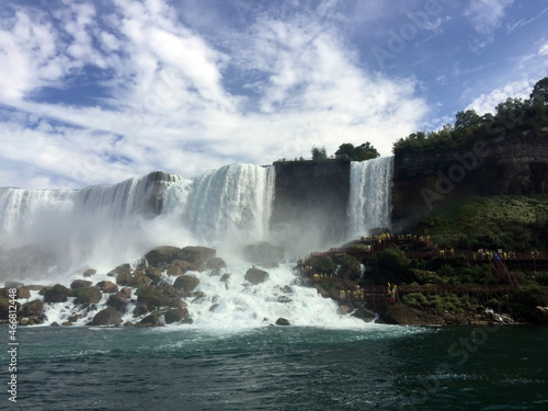 The American side of Niagara Falls, seen from a tour boat on the Niagara River. Bridal Veil Falls is seen to the right.