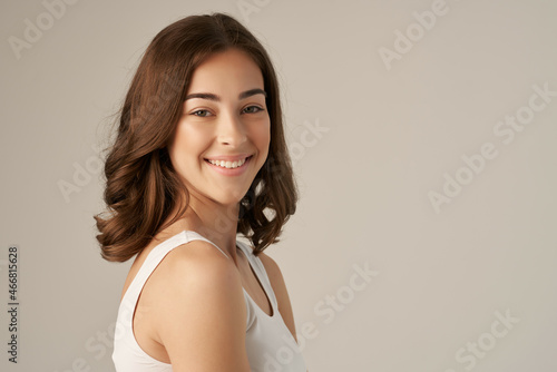 cheerful woman smile emotions clear skin Studio Lifestyle © SHOTPRIME STUDIO