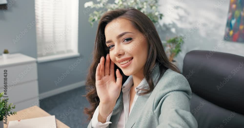 Blogger, vlogger, influencer leads live from work during the break, elegant beautiful woman waves to the camera, leads a video conversation, is seductive, flirtatious, smiling Blogger, vlogger, influencer leads live from work during the break, elegant beautiful woman waves to the camera, leads a video conversation, is seductive, flirtatious, smiling