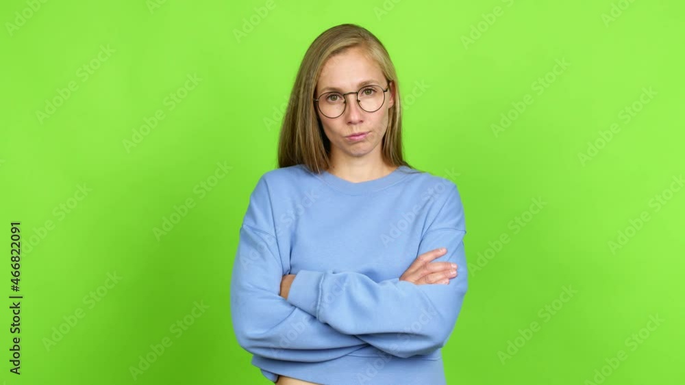 Young blonde girl with glasses. Green screen chroma key Young blonde girl with glasses. Green screen chroma key