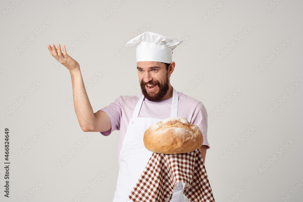 a man in a chef's uniform fresh bread cooking baking a man in a chef's uniform fresh bread cooking baking