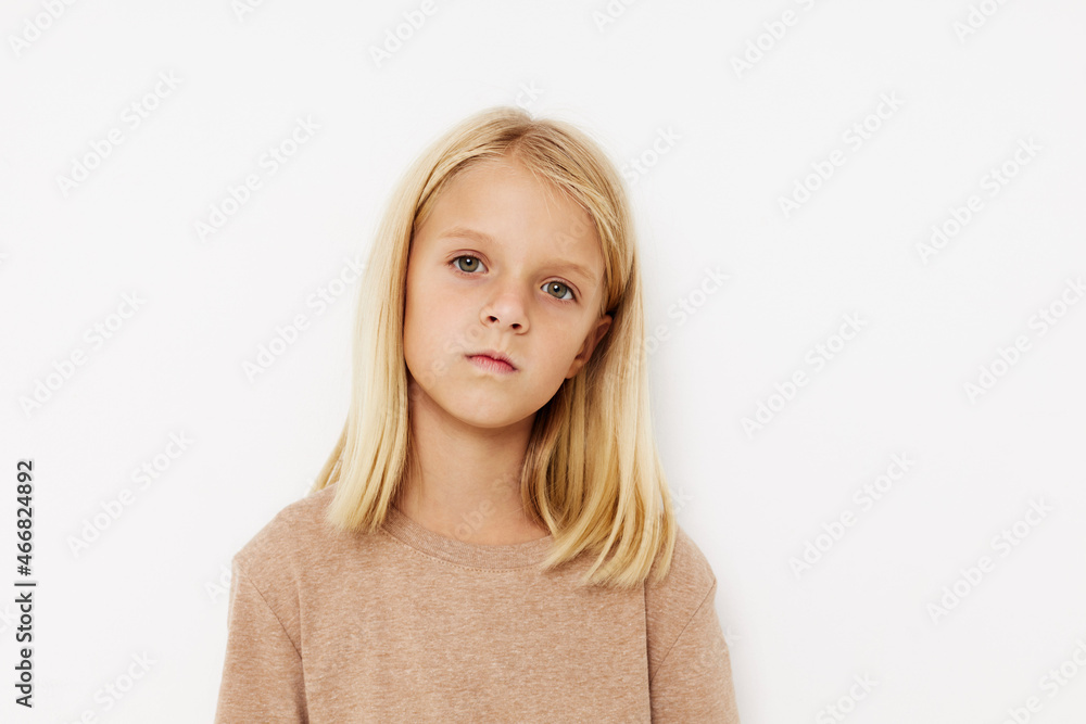 happy child with blond hair isolated background