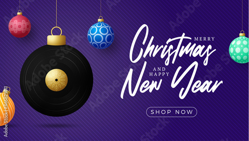musical vinyl record Christmas card. Merry Christmas music greeting card. Hang on a thread vinyl record as a xmas ball and golden bauble on black background. musical Vector illustration.