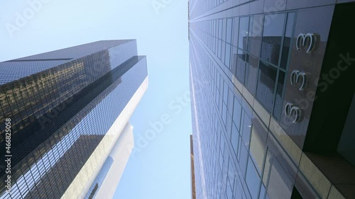 Glide shot of skyscrapers buildings street in downtown Los Angeles. LA offices, hotels, apartments. American modern urban lifestyle, tourism destination in USA.