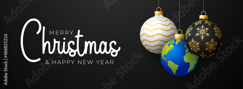 planet earth Christmas ball card. Merry Christmas world greeting card. Hang on a thread earth planet as a xmas ball bauble on black background. world Vector illustration.