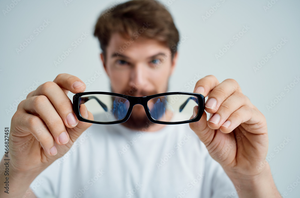 bearded man vision problems in white t-shirt isolated background bearded man vision problems in white t-shirt isolated background