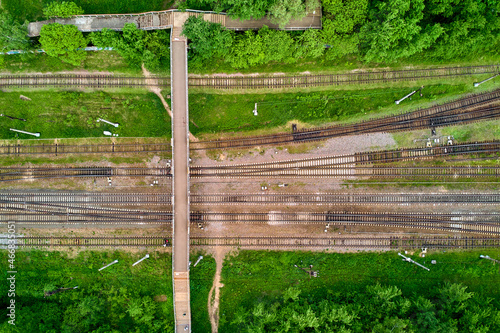 Pedestrian bridge over railway tracks  right angle aerial view