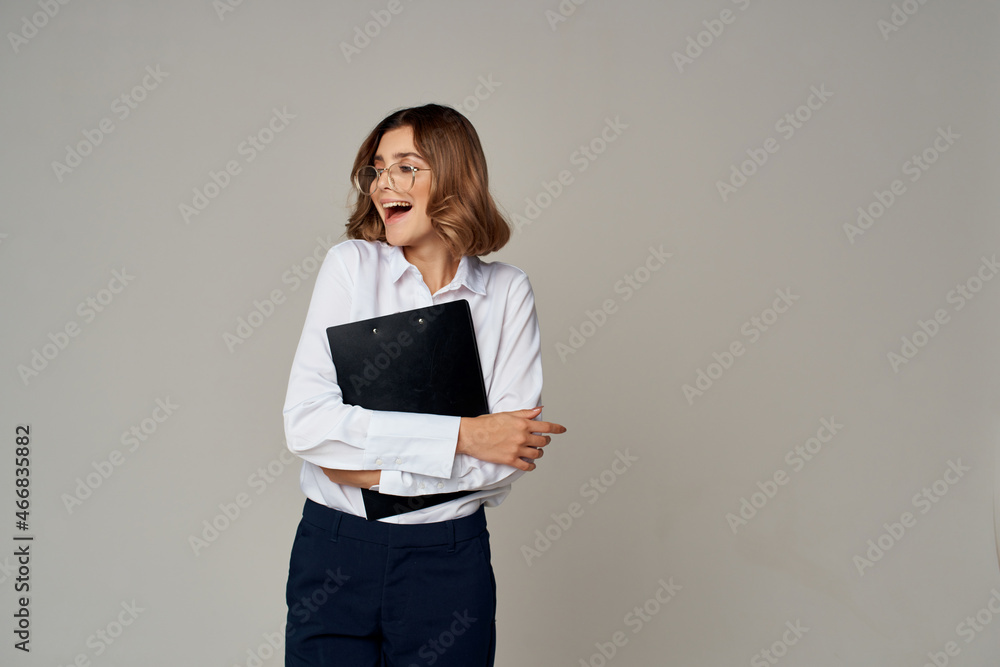 woman in suit with folder for papers Professional isolated background woman in suit with folder for papers Professional isolated background