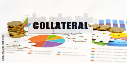 Fotografie There are coins and puzzles on financial charts with the inscription - COLLATERA