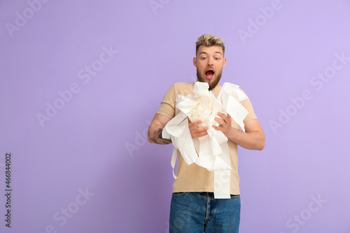 Surprised young man with cr...