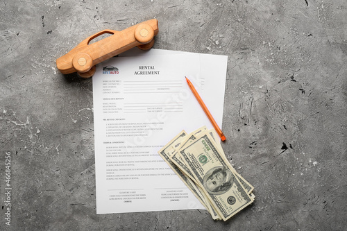 Rental agreement, pen, mone...