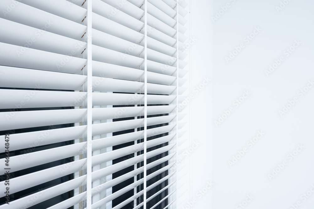 Adjusting vertical or venetian blinds. Design for adjust, close or open by cellular horizontal slate, panel, track or shutter to allow natural light, sunlight or sunshine to inside room or office. Adjusting vertical or venetian blinds. Design for adjust, close or open by cellular horizontal slate, panel, track or shutter to allow natural light, sunlight or sunshine to inside room or office.
