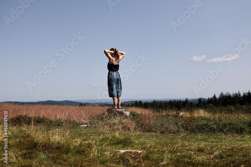 woman doing yoga exercises in the nature  © Lena