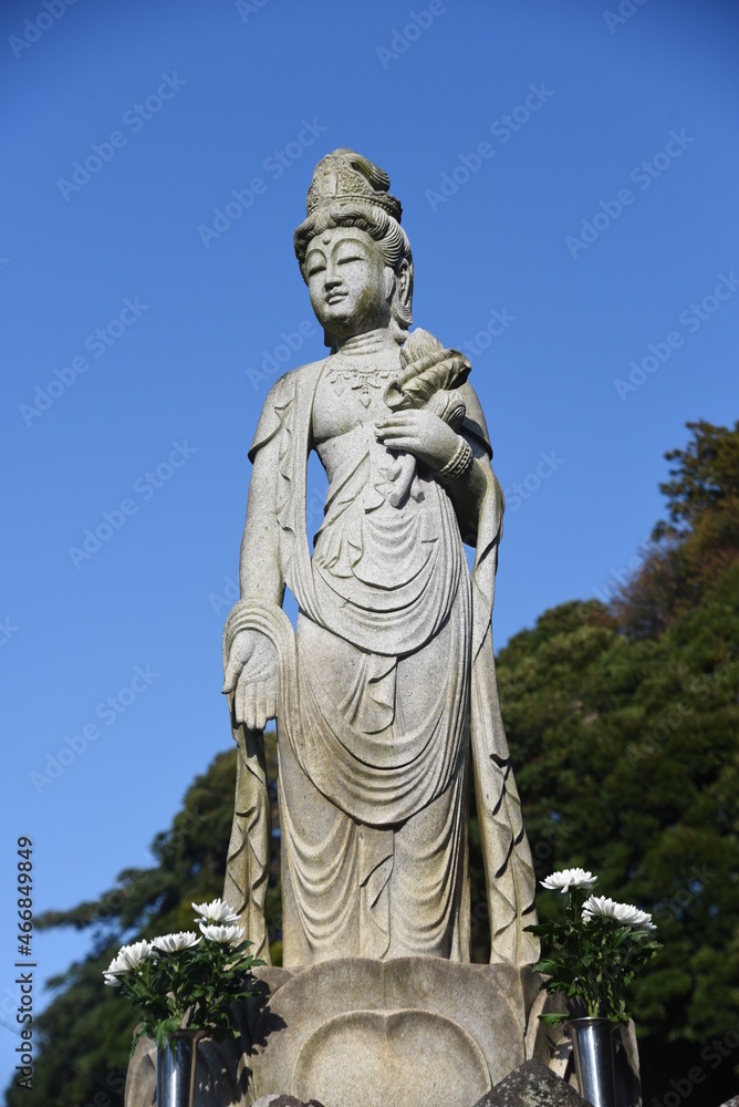 Guan yin (Kannon) statue. Kannon is a Buddha who removes people's suffering and listens to their wishes. 