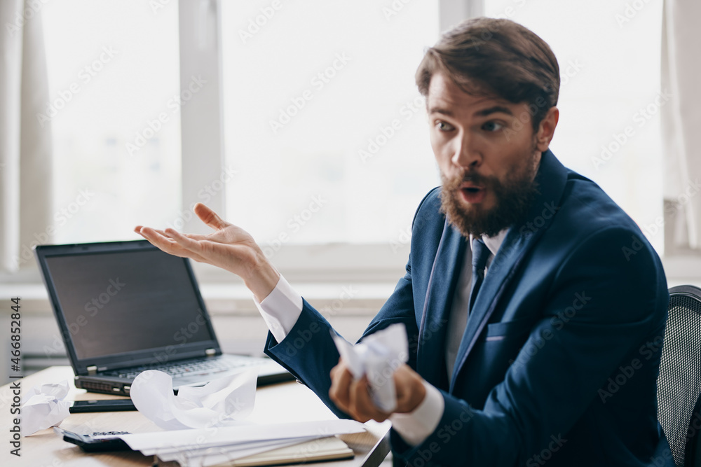 bearded man working for a laptop in the office emotions discontent professional bearded man working for a laptop in the office emotions discontent professional