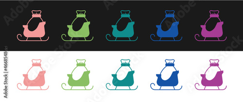 Set Christmas santa claus sleigh with sack bag icon isolated on black and white background. Merry Christmas and Happy New Year. Vector
