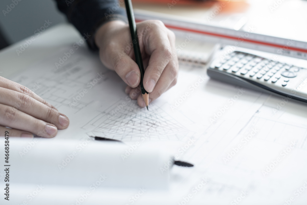 Architect working on blueprint. Architects workplace - architectural ...
