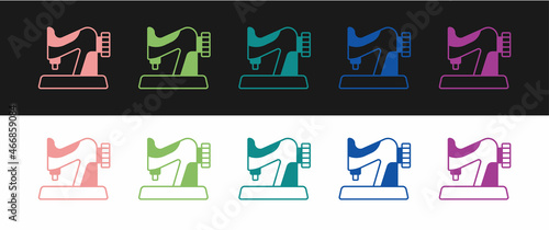 Set Sewing machine icon isolated on black and white background. Vector