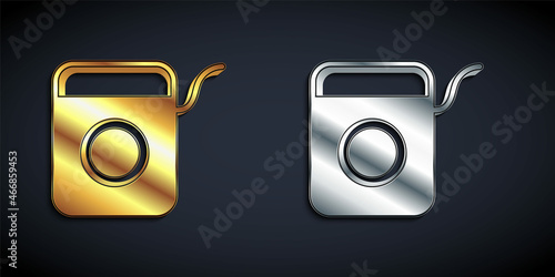 Gold and silver Dental floss icon isolated on black background. Long shadow style. Vector