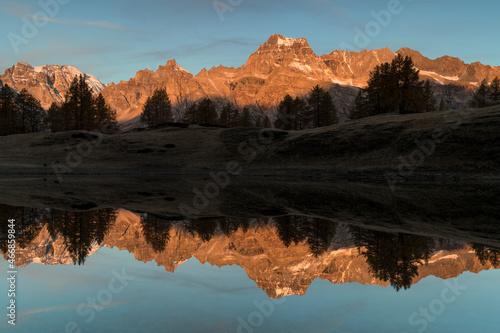 Autumn sunrise with reflections on Scherbadung peak, Alpe Devero and Veglia natural park