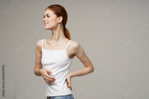 cheerful woman pulls herself up in a health jersey