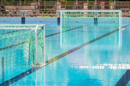 Water polo goal at the outdoor swimming pool. Water polo pool.