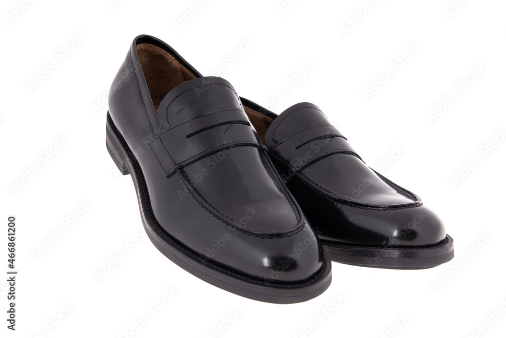 Black leather male shoes, isolated on white. Fashion concept
