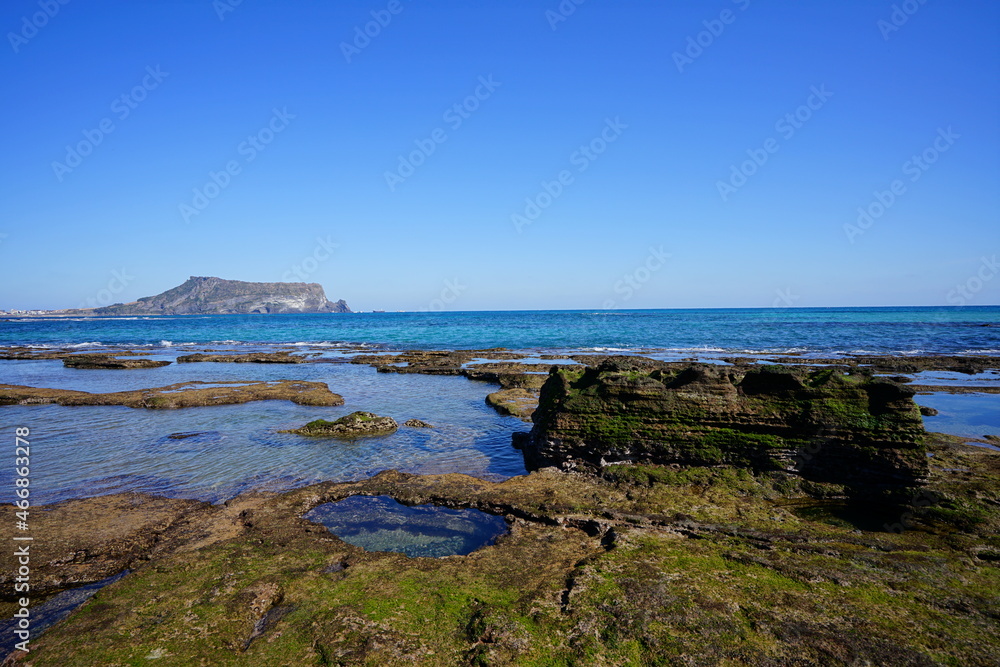 a beautiful rock coast with clear water a beautiful rock coast with clear water