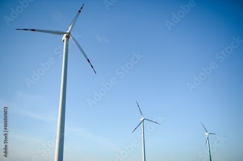 Wind turbines generating electricity. energy conservation concept.