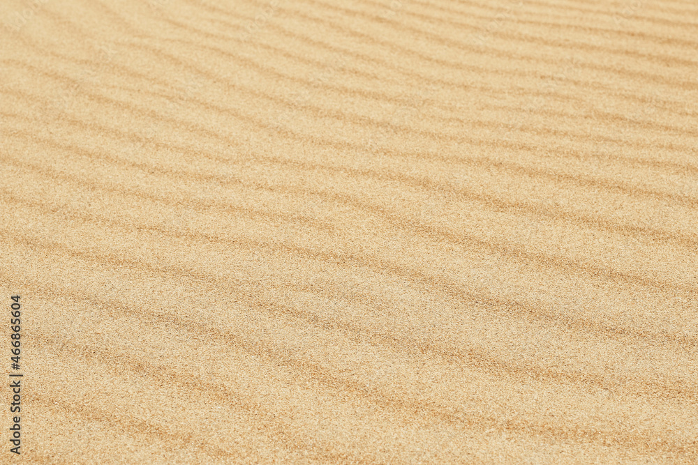 Sand texture. Sandy beach for background. Top view. Natural sand stone texture background. sand on the beach as background. Wavy sand background for summer designs. Sand texture. Sandy beach for background. Top view. Natural sand stone texture background. sand on the beach as background. Wavy sand background for summer designs.
