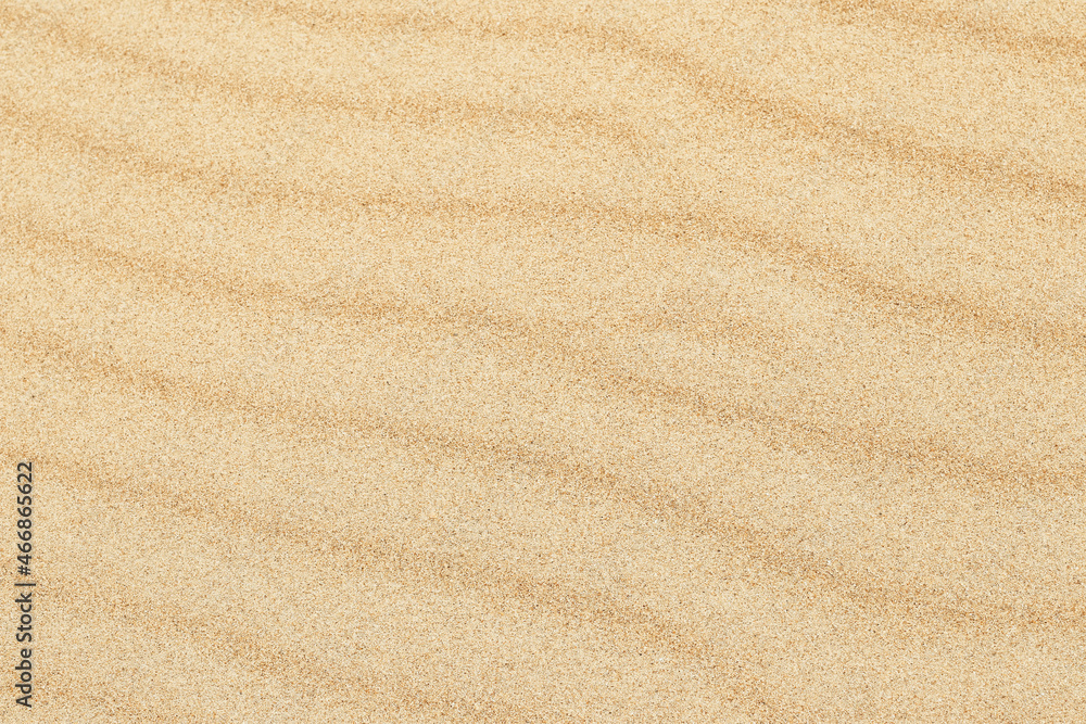 Sand texture. Sandy beach for background. Top view. Natural sand stone texture background. sand on the beach as background. Wavy sand background for summer designs. Sand texture. Sandy beach for background. Top view. Natural sand stone texture background. sand on the beach as background. Wavy sand background for summer designs.