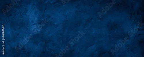 Panel kuchenny z motywem Dark blue rough grainy stone or concrete wall texture background