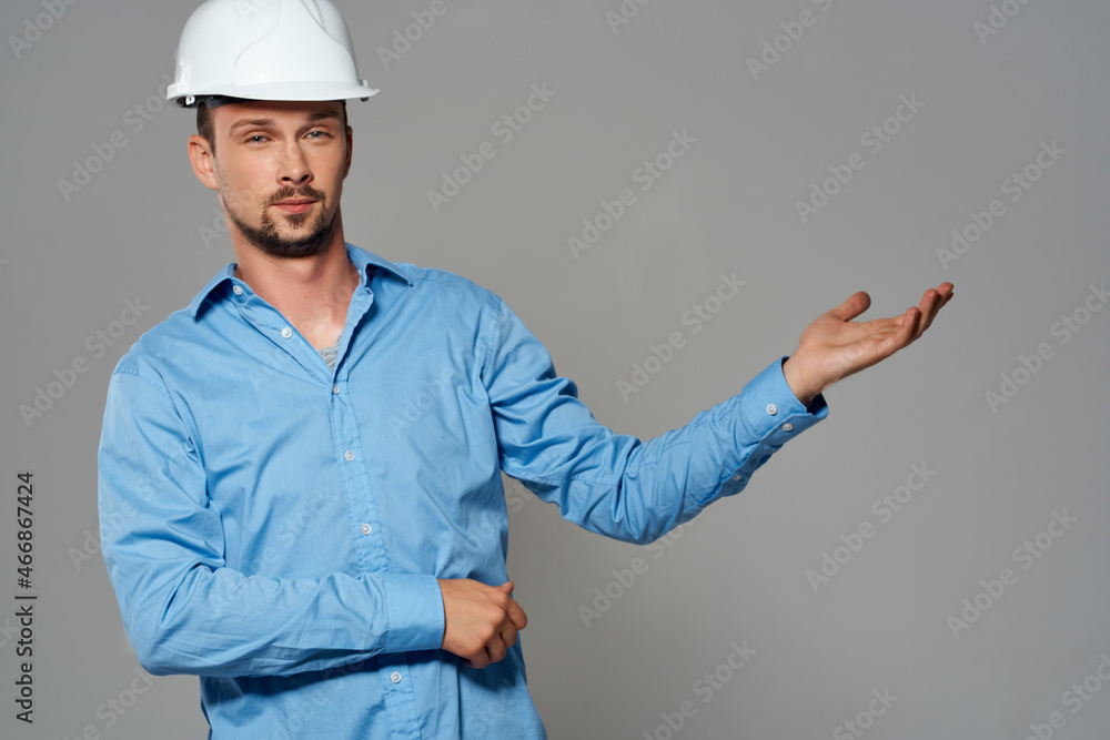worker with drawings in hand hand gesture light background worker with drawings in hand hand gesture light background