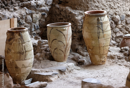  Recovered ancient pottery in prehistoric town of Akrotiri, excavation site of a Minoan Bronze Age settlement on the Greek island of Santorini photo