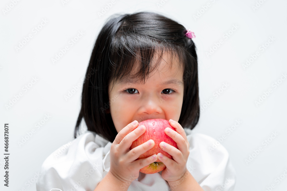 Child are hungry for eating apples. Children eat fruit to add vitamins to the body. Child are hungry for eating apples. Children eat fruit to add vitamins to the body.