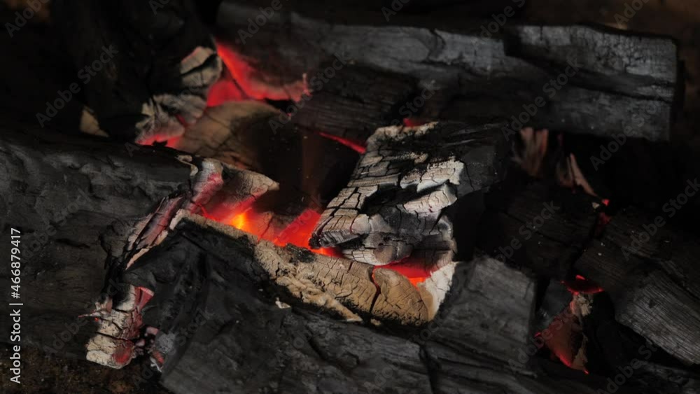 The charcoal is burning with a red fire. The charcoal is burning with a red fire.