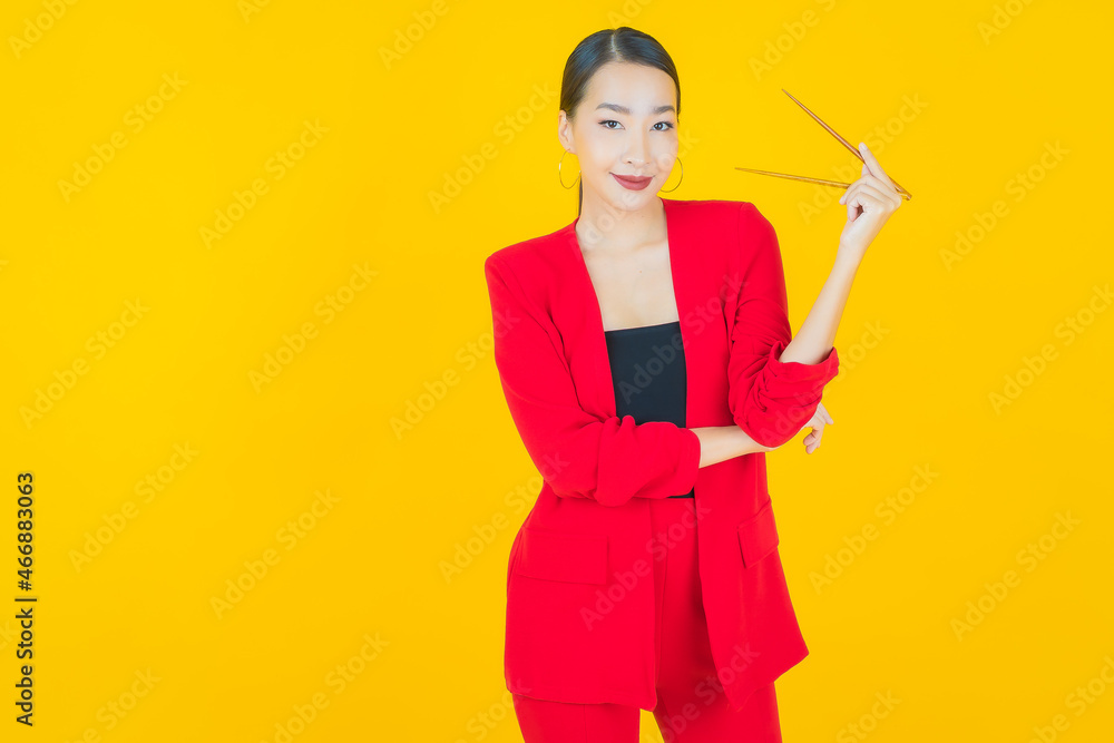 Portrait beautiful young asian woman with chopsticks Portrait beautiful young asian woman with chopsticks