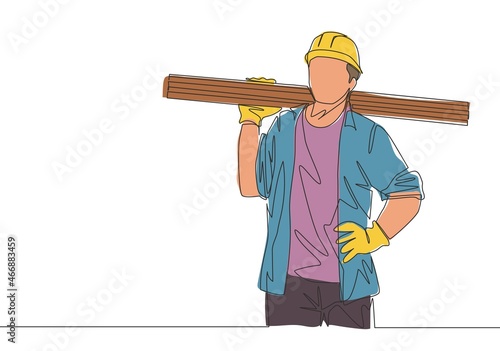 Single continuous line drawing of young lumberjack wearing helmet and glove while carrying stack of woods. Carpenter building maintenance service concept. One line draw design illustration