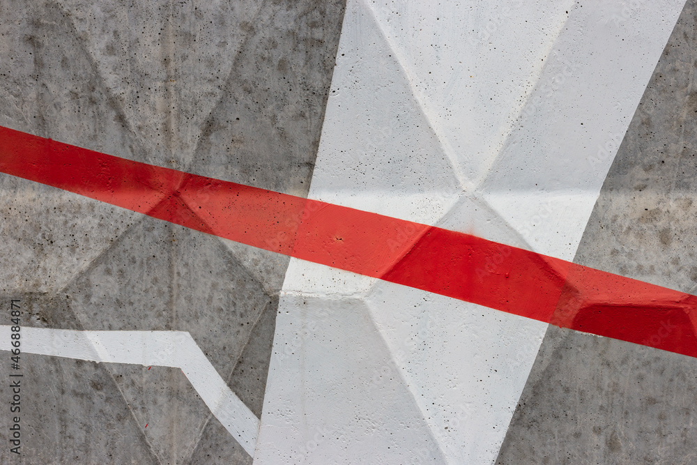 Fototapeta premium Red and white lines drawn on the fence. Abstract illustration.