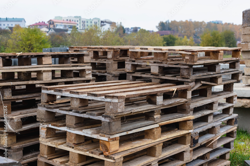 Wooden pallets for transporting building materials on a construction site Wooden pallets for transporting building materials on a construction site