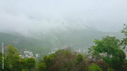 The misty mountain landscape from the Nakkerd hilltop, Chalong, Thailand photo