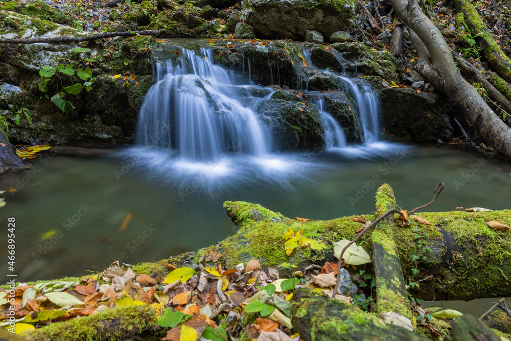 Small waterfall through the rocks covered by the moss in autumn in Zeleni vir, Croatia Small waterfall through the rocks covered by the moss in autumn in Zeleni vir, Croatia