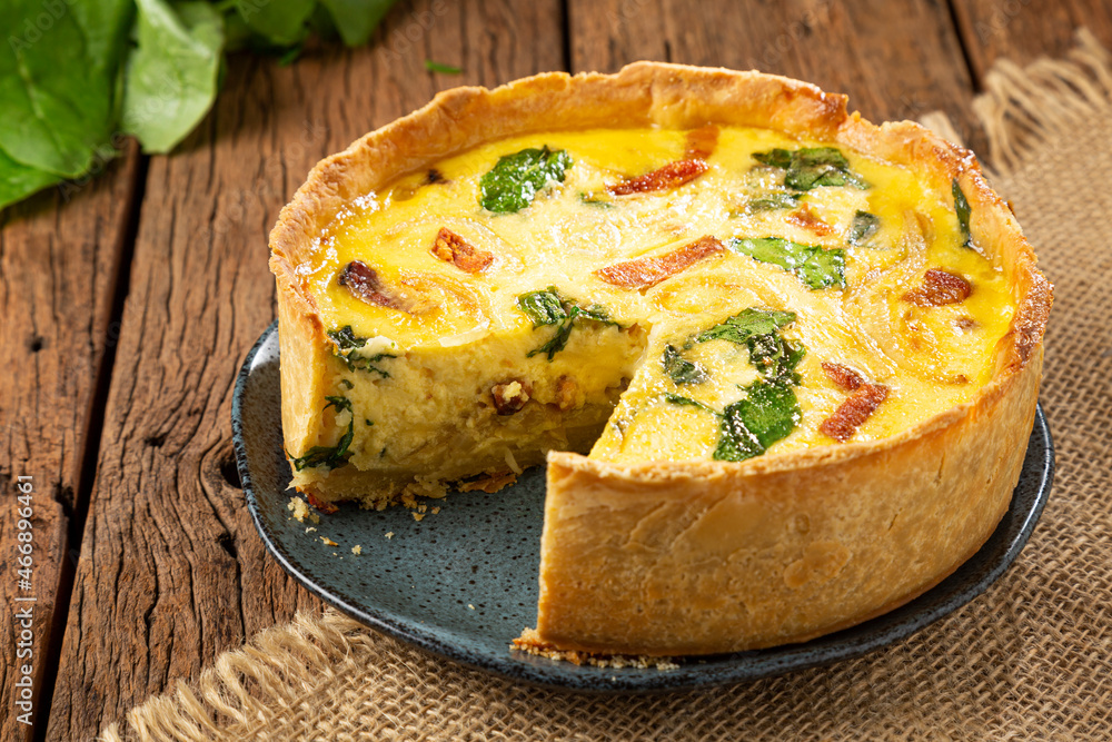 Spinach quiche with onion and bacon. Spinach quiche with onion and bacon.