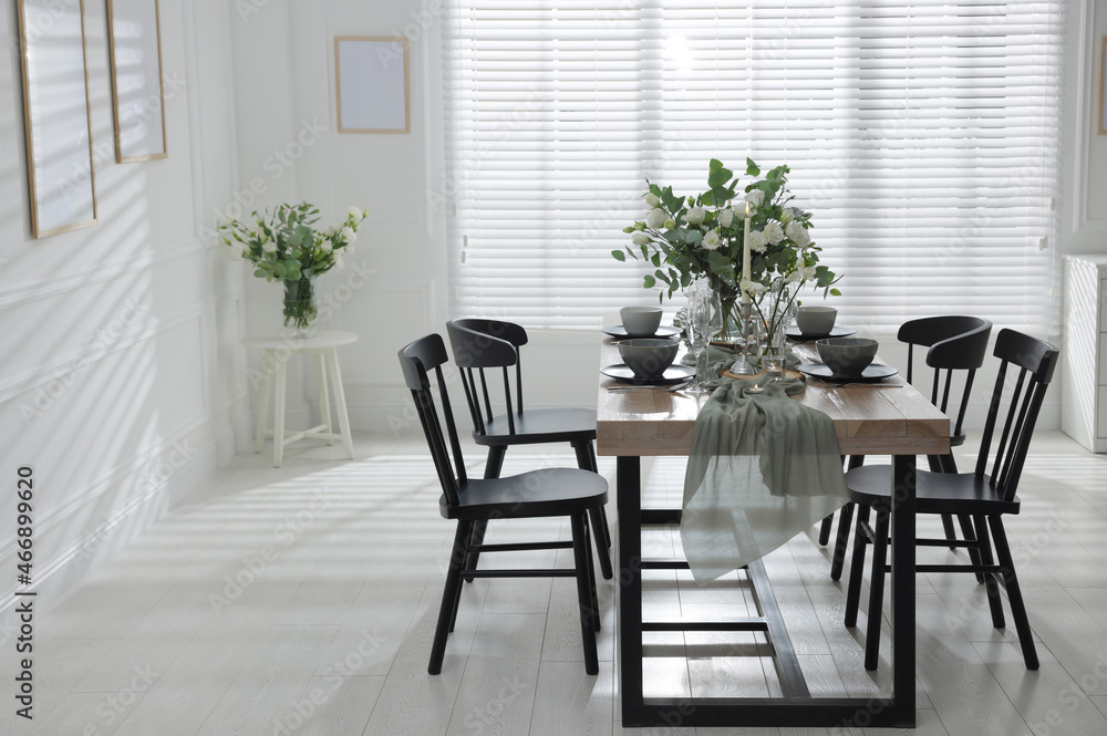 Fototapeta premium Festive table setting with beautiful tableware and decor indoors