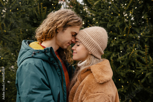 Cute Couple Having Winter Forest Picnic. Nature Picnic. Love Story Date. Lovely Couple Hugging