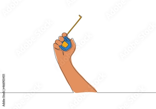One single line drawing of man holding measuring tape. Handyman tools concept. Continuous line draw vector design illustration