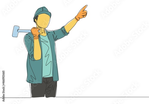 One single line drawing of young attractive handyman holding a hammer and pointing finger to the sky. Home renovation service concept continuous line draw design illustration