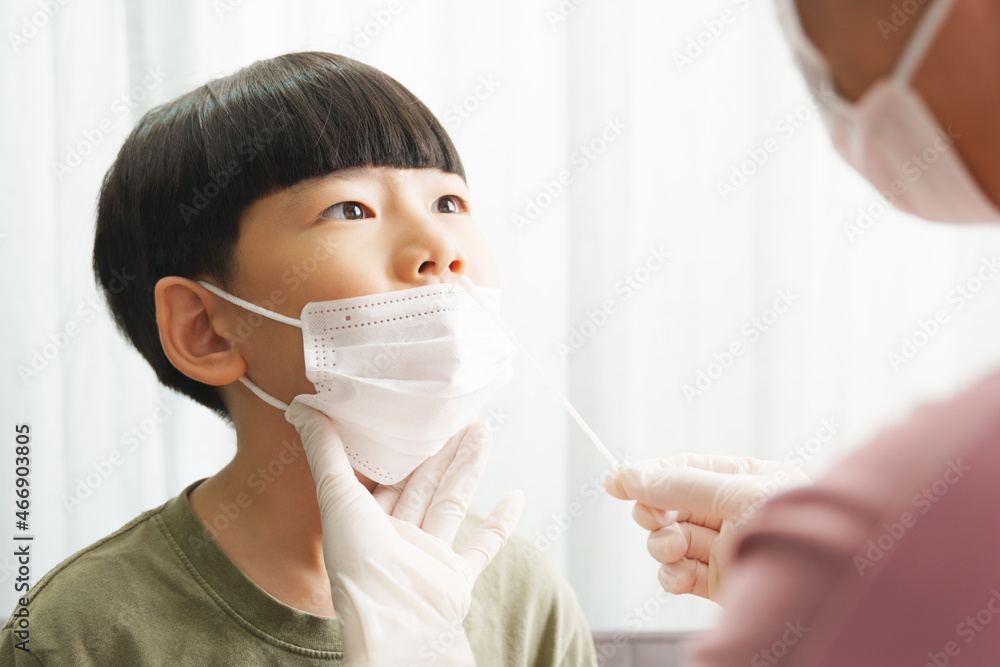 Covid 19 testing before back to school. An asian mom gently do a nose swab rapid test for her little boy at home. Living with Covid, Delta, Mu, New normal, Student, Kids, Small, How to, Tested, Reopen Covid 19 testing before back to school. An asian mom gently do a nose swab rapid test for her little boy at home. Living with Covid, Delta, Mu, New normal, Student, Kids, Small, How to, Tested, Reopen