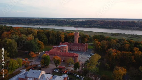 A rotating view of Raudone castle in Lithuania; an old red brick Teutonic castle photo